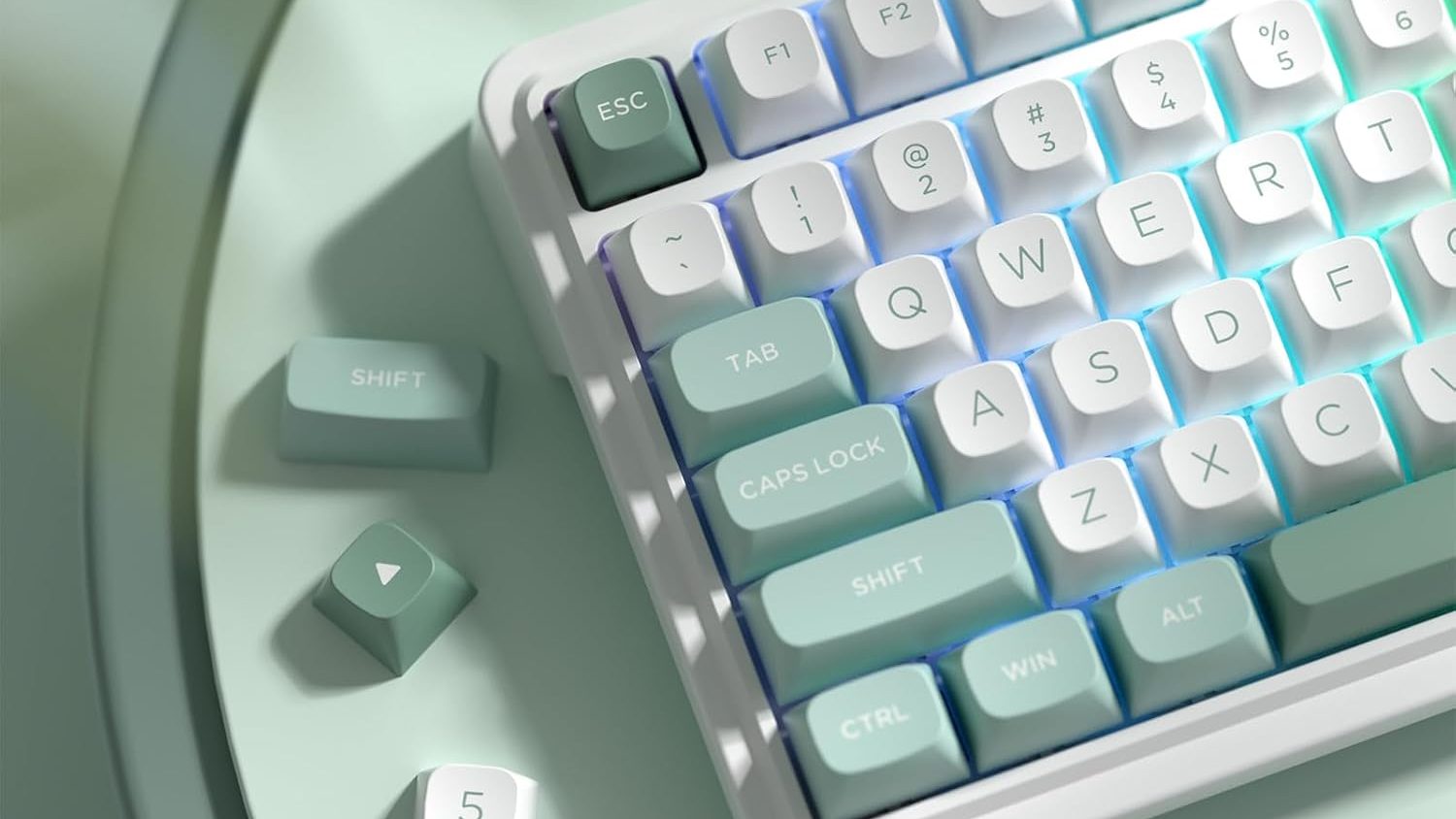 mint green budget mechanical keyboard with several keys laid off to side